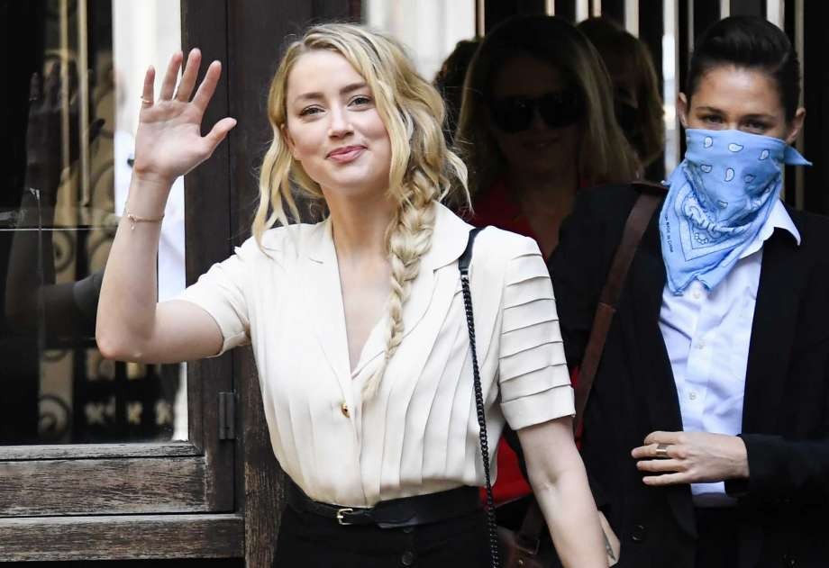 Amber Heard arrives at the High Court, in London, Monday, July 20, 2020. Amber Heard started Monday to give evidence at the High Court in London as part of Johnny Depp’s libel case against The Sun over allegations of domestic violence during the couple's relationship. (AP Photo)